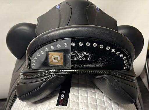 Horse saddle with embedded NFC chip visible on the cantle